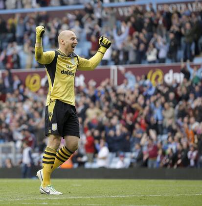Aston Villa goalkeeper Brad Guzan celebrates after his side s winning goal - Football - Barclays Premier League - Aston Villa vs Manchester City - Villa Park Birmingham - Season 2013-2014 - September 28th 2013 - Photograph Malcolm Couzens Sportimage EDITORIAL USE ONLY. No use with unauthorised audio, video, data, fixture lists, club league logos or live services. Online in-match use limited to 120 images, no video emulation. No use in betting, games or single club league player publications.