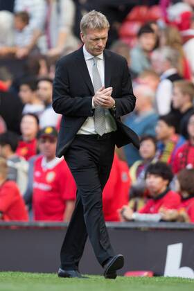 David Moyes, manager of Manchester United trudges off looking thoughtful - Manchester United vs. West Bromwich Albion - Barclay s Premier League - Old Trafford - Manchester - 28 09 2013 Pic Philip Oldham Sportimage EDITORIAL USE ONLY. No use with unauthorised audio, video, data, fixture lists, club league logos or live services. Online in-match use limited to 120 images, no video emulation. No use in betting, games or single club league player publications.