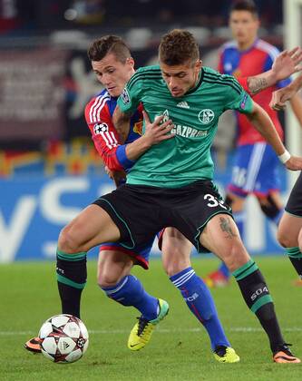 01.10.2013, xjhx, Fussball Champions League, FC Basel - FC Schalke 04, v.l. Taulant Xhaka (FC Basel), Roman Neustaedter (FC Schalke 04)