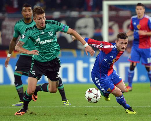 01.10.2013, xjhx, Fussball Champions League, FC Basel - FC Schalke 04, v.l. Roman Neustaedter (FC Schalke 04), Taulant Xhaka (FC Basel)