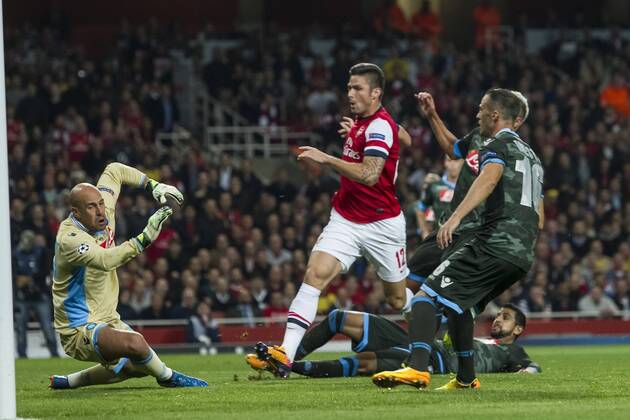 01.10.2013 London, England. Arsenal forward Olivier Giroud (12) makes it 2-0 during the UEFA Champions League Group Stage fixture between Arsenal and SSC Napoli from the Emirates Stadium xDavidxFearnx  ActionPlus20148812