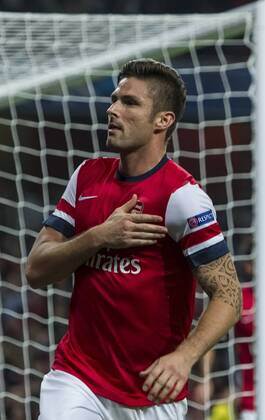 01.10.2013 London, England. Arsenal forward Olivier Giroud (12) celebrates his goal during the UEFA Champions League Group Stage fixture between Arsenal and SSC Napoli from the Emirates Stadium xDavidxFearnx  ActionPlus20148813