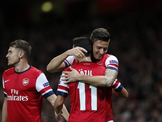 Arsenal s Olivier Giroud celebrates scoring his sides second goal Arsenal FC Lodnon v SSC Napoli - Champions League - Emirates Stadium - London - England -01 10 2013 - EDITORIAL USE ONLY. No use with unauthorised audio, video, data, fixture lists, club league logos or live services. Online in-match use limited to 120 images, no video emulation. No use in betting, games or single club league player publications.
