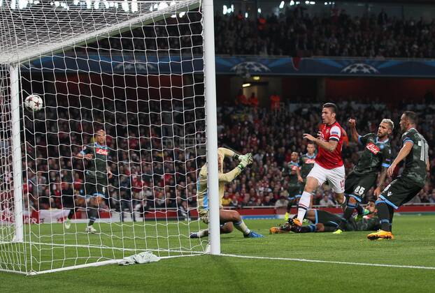 Arsenal s Olivier Giroud scoring his sides second goal Arsenal FC Lodnon v SSC Napoli - Champions League - Emirates Stadium - London - England -01 10 2013 - EDITORIAL USE ONLY. No use with unauthorised audio, video, data, fixture lists, club league logos or live services. Online in-match use limited to 120 images, no video emulation. No use in betting, games or single club league player publications.