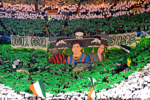 Celtic fans with a banner - UEFA Champions League Group H - - Celtic Park Stadium - Glasgow - Scotland - 01 10 13 - Picture Simon Bellis Sportimage EDITORIAL USE ONLY. No use with unauthorised audio, video, data, fixture lists, club league logos or live services. Online in-match use limited to 120 images, no video emulation. No use in betting, games or single club league player publications.