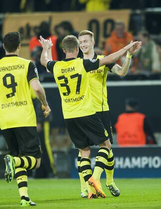 Jubel Marco REUS r. (DO) nach seinem Tor zum 2:0, mit Eric DURM, Fussball Champions League, Vorrunde, 2. Spieltag, Borussia Dortmund (DO) - Olympique Marseille (MAR), am 01.10.2013 in Dortmund Deutschland.