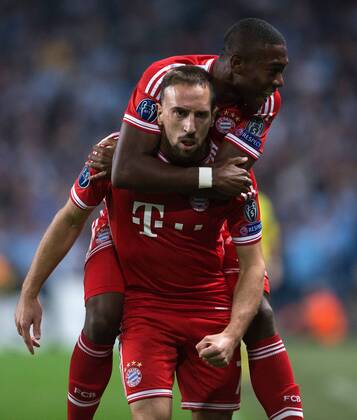 David Alaba joins Frank Ribery of Munich in celebration of the opening goal - Manchester City vs. FC Bayern Munich - UEFA Champion s League - Etihad Stadium - Manchester - 02 19 2013 Pic Philip Oldham Sportimage EDITORIAL USE ONLY. No use with unauthorised audio, video, data, fixture lists, club league logos or live services. Online in-match use limited to 120 images, no video emulation. No use in betting, games or single club league player publications.