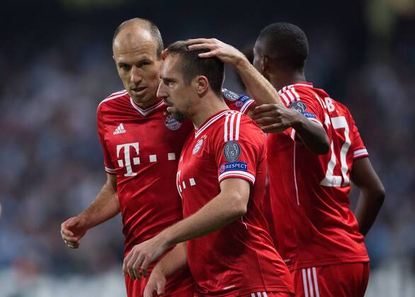 Arjen Robben of Munich congratulates Frank Ribery on his opening goal - Manchester City vs. FC Bayern Munich - UEFA Champion s League - Etihad Stadium - Manchester - 02 19 2013 Pic Philip Oldham Sportimage EDITORIAL USE ONLY. No use with unauthorised audio, video, data, fixture lists, club league logos or live services. Online in-match use limited to 120 images, no video emulation. No use in betting, games or single club league player publications.