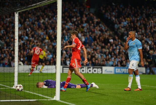 Joe Hart of Manchester City lies flat out after conceding the third goal from Arjen Robben of Bayern Munich - UEFA Champions League Group D - Manchester City vs Bayern Munich - Etihad Stadium - Manchester - England - 02 10 13 - Picture Simon Bellis Sportimage EDITORIAL USE ONLY. No use with unauthorised audio, video, data, fixture lists, club league logos or live services. Online in-match use limited to 120 images, no video emulation. No use in betting, games or single club league player publications.