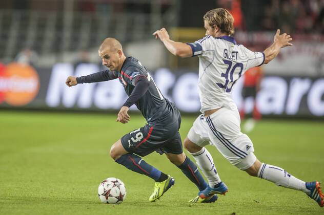 Anderlecht , Belgium October , 02 2013 Football. Champions League RSC Anderlecht vs Olympiacos FC On this picture : Vladimir Weiss Guillaume Gillet © Reporters Michel Gouverneur 