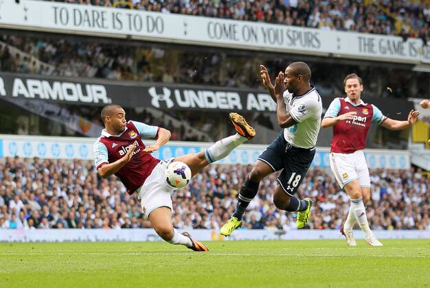 Tottenham s Jermain Defoe tussles with West Ham s Winston Reid Tottenham Hotspur - West Ham United - Premier League - White Hart Lane - London - England -06 10 2013 - xDavidxKleinx EDITORIAL USE ONLY. No use with unauthorised audio, video, data, fixture lists, club league logos or live services. Online in-match use limited to 120 images, no video emulation. No use in betting, games or single club league player publications.