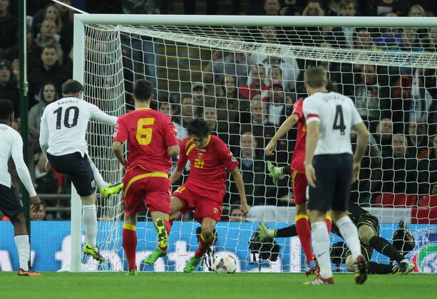 England v Montenegro - World Cup Qualifier . . Wembley, London, UK . . 11.10.2013 Wayne Rooney scores a goal for England. 1-0