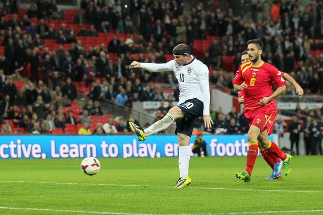 England s Wayne Rooney scoring his sides opening goal England v Montenegro - World Cup Qualifier - London - Wembley - England -11 10 2013 - Pic David Klein Sportimage EDITORIAL USE ONLY. No use with unauthorised audio, video, data, fixture lists, club league logos or live services. Online in-match use limited to 120 images, no video emulation. No use in betting, games or single club league player publications.