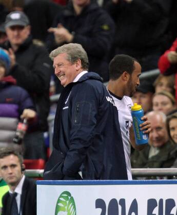 England v Montenegro - World Cup Qualifier . . Wembley, London, UK . . 11.10.2013 England manager Roy Hodgson grins broadly after taking off Andros Townsend (E)