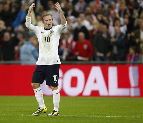 England s Wayne Rooney celebrates scoring his sides opening goal England v Poland - 2014 World Cup Qualifier - Wembley - London - England -15 10 2013 - Pic David Klein Sportimage EDITORIAL USE ONLY. No use with unauthorised audio, video, data, fixture lists, club league logos or live services. Online in-match use limited to 120 images, no video emulation. No use in betting, games or single club league player publications.