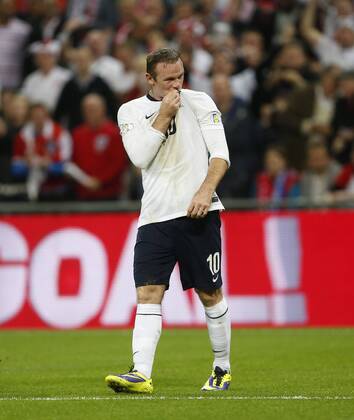England s Wayne Rooney celebrates scoring his sides opening goal England v Poland - 2014 World Cup Qualifier - Wembley - London - England -15 10 2013 - Pic David Klein Sportimage EDITORIAL USE ONLY. No use with unauthorised audio, video, data, fixture lists, club league logos or live services. Online in-match use limited to 120 images, no video emulation. No use in betting, games or single club league player publications.