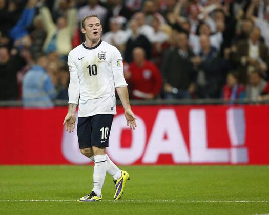 England s Wayne Rooney celebrates scoring his sides opening goal England v Poland - 2014 World Cup Qualifier - Wembley - London - England -15 10 2013 - Pic David Klein Sportimage EDITORIAL USE ONLY. No use with unauthorised audio, video, data, fixture lists, club league logos or live services. Online in-match use limited to 120 images, no video emulation. No use in betting, games or single club league player publications.