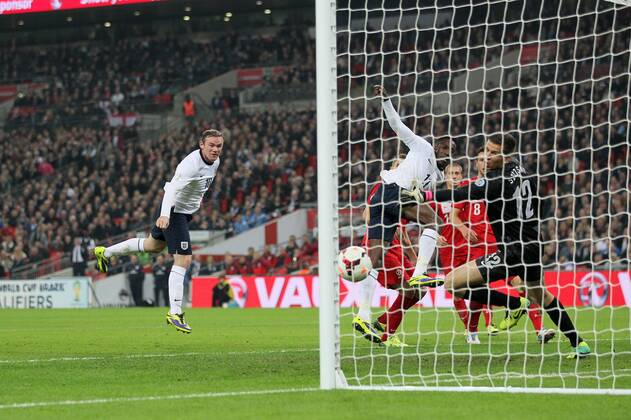 England s Wayne Rooney scoring his sides opening goal England v Poland - 2014 World Cup Qualifier - Wembley - London - England -15 10 2013 - Pic David Klein Sportimage EDITORIAL USE ONLY. No use with unauthorised audio, video, data, fixture lists, club league logos or live services. Online in-match use limited to 120 images, no video emulation. No use in betting, games or single club league player publications.