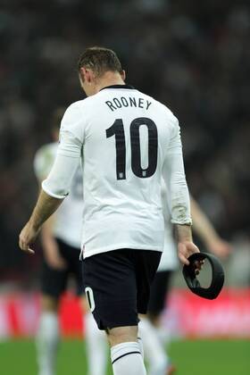 England v Poland - World Cup Qualifier . . Wembley, London, UK . . 15.10.2013 Wayne Rooney (England) carries his headband.