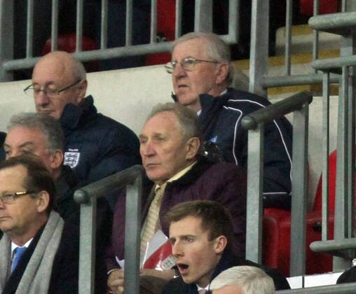 England v Poland - World Cup Qualifier . . Wembley, London, UK . . 15.10.2013 Former England manager Howard Wilkinson (purple jacket) watches from the stands.