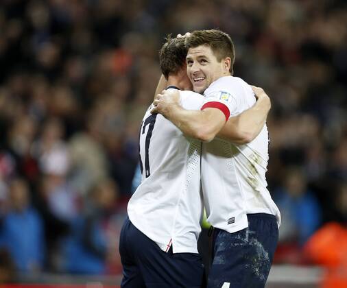 England s Steven Gerrard celebrates at the final whistle England v Poland - 2014 World Cup Qualifier - Wembley - London - England -15 10 2013 - Pic David Klein Sportimage EDITORIAL USE ONLY. No use with unauthorised audio, video, data, fixture lists, club league logos or live services. Online in-match use limited to 120 images, no video emulation. No use in betting, games or single club league player publications.