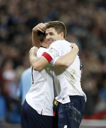 England s Steven Gerrard celebrates at the final whistle England v Poland - 2014 World Cup Qualifier - Wembley - London - England -15 10 2013 - Pic David Klein Sportimage EDITORIAL USE ONLY. No use with unauthorised audio, video, data, fixture lists, club league logos or live services. Online in-match use limited to 120 images, no video emulation. No use in betting, games or single club league player publications.