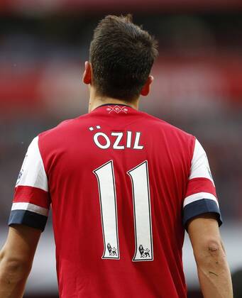 Arsenal s Mesut Ozil s shirt Arsenal FC London v Norwich City - Barclays Premier League - Emirates Stadium - London - England -19 10 2013 - EDITORIAL USE ONLY. No use with unauthorised audio, video, data, fixture lists, club league logos or live services. Online in-match use limited to 120 images, no video emulation. No use in betting, games or single club league player publications.