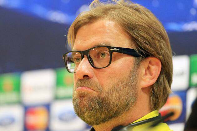 Trainer Jürgen Klopp (Borussia Dortmund) nachdenklich, konzentriert, fokussiert mit zusammen gepressten Lippen Pressekonferenz --- Fussball --- Champions League --- 21.10.2013 EP_JSE