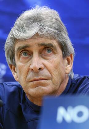 ITAR-TASS: MOSCOW, RUSSIA. OCTOBER 22, 2013. Man. City s manager Manuel Pellegrini looks on during a news conference ahead of the first leg of their UEFA Champions League Group S football match against CSKA Moscow.  RE12D82B