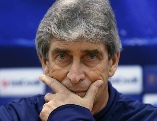ITAR-TASS: MOSCOW, RUSSIA. OCTOBER 22, 2013. Man. City s manager Manuel Pellegrini looks on during a news conference ahead of the first leg of their UEFA Champions League Group S football match against CSKA Moscow.  RE12D82E