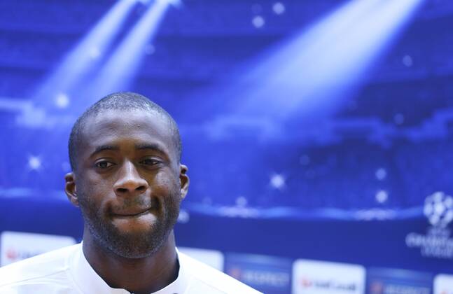 ITAR-TASS: MOSCOW, RUSSIA. OCTOBER 22, 2013. Man. City s midfielder Yaya Toure at a news conference ahead of the first leg of their UEFA Champions League Group S football match against CSKA Moscow.  RE12D833
