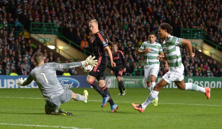 Fraser Forster of Celtic makes a save from Kolbelnn Sigthorsson of Ajax - UEFA Champions League Group H - Celtic vs Ajax - Celtic Park Stadium - Glasgow - Scotland - 22 10 13 - Picture Simon Bellis Sportimage EDITORIAL USE ONLY. No use with unauthorised audio, video, data, fixture lists, club league logos or live services. Online in-match use limited to 120 images, no video emulation. No use in betting, games or single club league player publications.