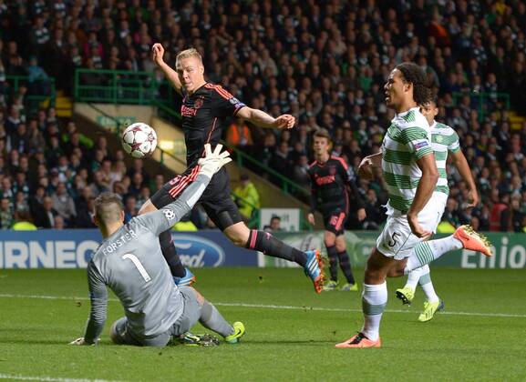 Fraser Forster of Celtic makes a save from Kolbelnn Sigthorsson of Ajax - UEFA Champions League Group H - Celtic vs Ajax - Celtic Park Stadium - Glasgow - Scotland - 22 10 13 - Picture Simon Bellis Sportimage EDITORIAL USE ONLY. No use with unauthorised audio, video, data, fixture lists, club league logos or live services. Online in-match use limited to 120 images, no video emulation. No use in betting, games or single club league player publications.