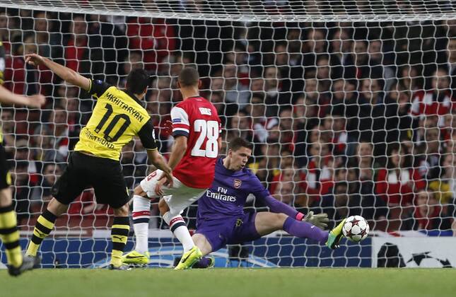 Dortmund s Henrikh Mkhitaryan scoring his sides opening goal Arsenal v Dortmund - UEFA Champions League - the Emirates - London - England -22 10 2013 - Pic David Klein Sportimage EDITORIAL USE ONLY. No use with unauthorised audio, video, data, fixture lists, club league logos or live services. Online in-match use limited to 120 images, no video emulation. No use in betting, games or single club league player publications.