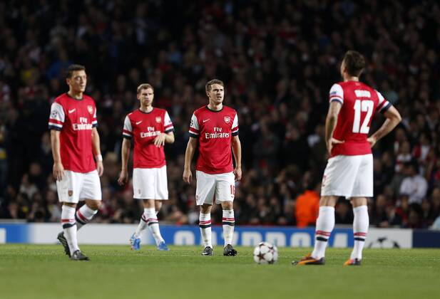 Arsenal s Aaron Ramsey looks on dejected after going 1-0 down Arsenal v Dortmund - UEFA Champions League - the Emirates - London - England -22 10 2013 - Pic David Klein Sportimage EDITORIAL USE ONLY. No use with unauthorised audio, video, data, fixture lists, club league logos or live services. Online in-match use limited to 120 images, no video emulation. No use in betting, games or single club league player publications.