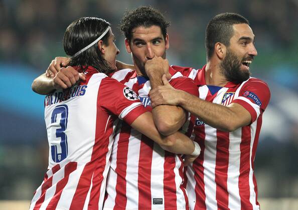 FUSSBALL - CL, A.Wien vs Atletico WIEN,AUSTRIA,22.OKT.13 - FUSSBALL - UEFA Champions League, Gruppenphase, FK Austria Wien vs Atletico Madrid. Bild zeigt den Jubel von Raul Garcia und Filipe Luis und Arda Turan (Atletico). 