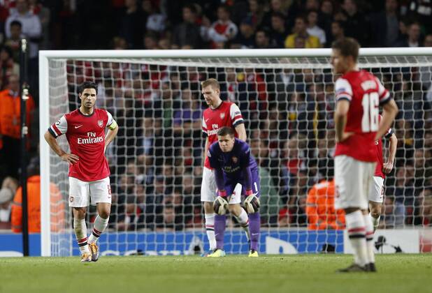 Arsenal s Mikel Arteta looks on dejected after going 2-1 down Arsenal v Dortmund - UEFA Champions League - the Emirates - London - England -22 10 2013 - Pic David Klein Sportimage EDITORIAL USE ONLY. No use with unauthorised audio, video, data, fixture lists, club league logos or live services. Online in-match use limited to 120 images, no video emulation. No use in betting, games or single club league player publications.