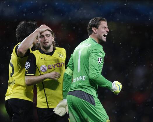 Dortmund s Roman Weidenfeller celebrates at the final whistle Arsenal v Dortmund - UEFA Champions League - the Emirates - London - England -22 10 2013 - Pic David Klein Sportimage EDITORIAL USE ONLY. No use with unauthorised audio, video, data, fixture lists, club league logos or live services. Online in-match use limited to 120 images, no video emulation. No use in betting, games or single club league player publications.