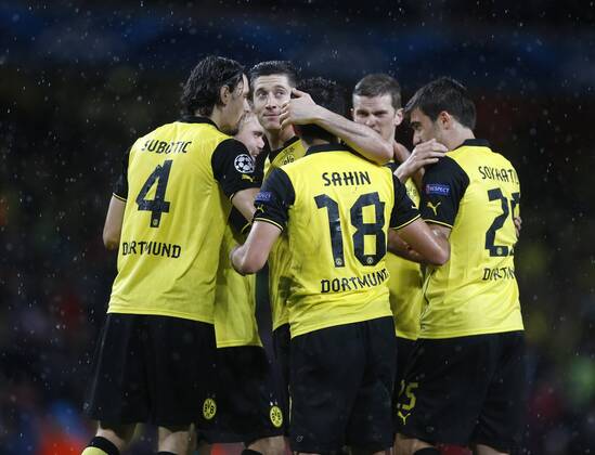 Dortmund s Robert Lewandowski celebrates at the final whistle Arsenal v Dortmund - UEFA Champions League - the Emirates - London - England -22 10 2013 - Pic David Klein Sportimage EDITORIAL USE ONLY. No use with unauthorised audio, video, data, fixture lists, club league logos or live services. Online in-match use limited to 120 images, no video emulation. No use in betting, games or single club league player publications.