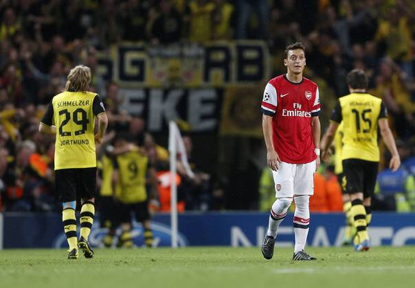 Arsenal s Mesut Ozil looks on dejected after going 2-1 down Arsenal v Dortmund - UEFA Champions League - the Emirates - London - England -22 10 2013 - Pic David Klein Sportimage EDITORIAL USE ONLY. No use with unauthorised audio, video, data, fixture lists, club league logos or live services. Online in-match use limited to 120 images, no video emulation. No use in betting, games or single club league player publications.