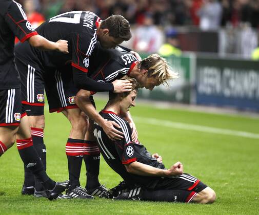 Leverkusen, BayArena, 23.10.13: Leverkusens Stefan Kießling celebrates scoring the 1:0 with teammate Simon Rolfes (M) and Sebastian Boenisch during the match between Bayer 04 Leverkusen vs. Schachtar Donezk in the champions league season 2013 2014. Bayer 04 Leverkusen vs. Schachtar Donezk in der Gruppenphase der UEFA Championsleague.