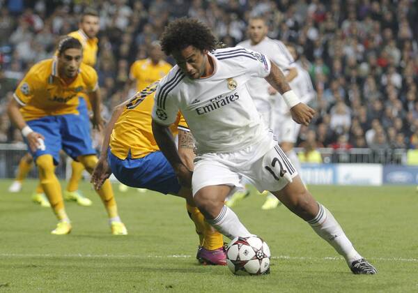 Soccer match between Real Madrid and Juventus Turin of the Champions League, held at the Santiago Bernabeu stadium, in Madrid 10 23 2013. Marcelo 