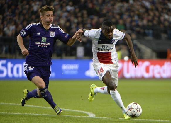 Dennis Praet of RSC Anderlecht and Blaise Matuidi of PSG RSC Anderlecht vs PSG Paris Saint Germain - 23 10 2013 PhotoNews Panoramic 