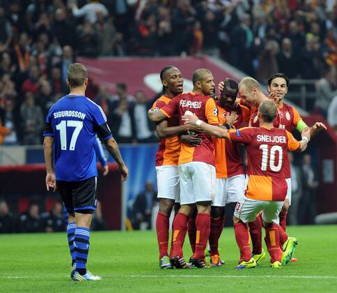 UEFA Champions League group B match between Galatasaray and FC Copenhagen at Turk Telekom Arena Stadium on October 23, 2013 in Istanbul, Turkey Pictured: Galatasaray s Wesley Sneijder and other players celebrates after goal. 