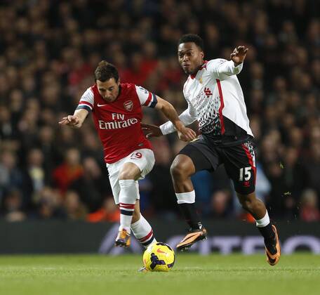 Arsenal s Santi Cazorla tussles with Liverpool s Daniel Sturridge Arsenal v Liverpool - Barclays Premier League - Emirates Stadium - London - England -02 11 2013 - Pic David Klein Sportimage EDITORIAL USE ONLY. No use with unauthorised audio, video, data, fixture lists, club league logos or live services. Online in-match use limited to 120 images, no video emulation. No use in betting, games or single club league player publications.