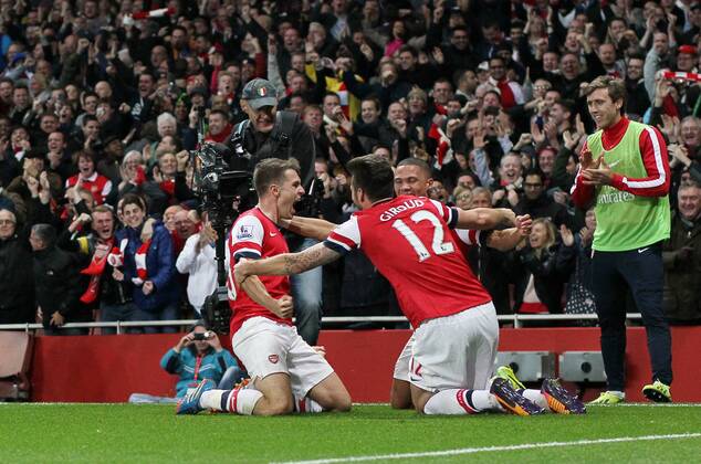 Arsenal s Aaron Ramsey celebrates scoring his sides second goal Arsenal v Liverpool - Barclays Premier League - Emirates Stadium - London - England -02 11 2013 - Pic David Klein Sportimage EDITORIAL USE ONLY. No use with unauthorised audio, video, data, fixture lists, club league logos or live services. Online in-match use limited to 120 images, no video emulation. No use in betting, games or single club league player publications.
