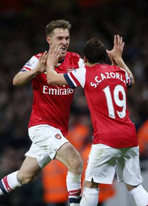 Arsenal s Aaron Ramsey celebrates scoring his sides second goal Arsenal v Liverpool - Barclays Premier League - Emirates Stadium - London - England -02 11 2013 - Pic David Klein Sportimage EDITORIAL USE ONLY. No use with unauthorised audio, video, data, fixture lists, club league logos or live services. Online in-match use limited to 120 images, no video emulation. No use in betting, games or single club league player publications.