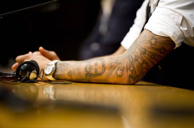 A detail of the watch and a tattoo in the left arm of FC Barcelona s Daniel Alves during a press conference at Camp Nou Stadium in Barcelona. November 5, 2013.  (20131105053)