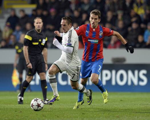 Martin Zeman (Plzen, right) and Franck Ribery (Bayern) are pictured during their 4th round of the Champions League group D soccer match FC Viktoria Plzen vs. FC Bayern Munich in Pilsen, Czech Republic, November 5, 2013. (CTKxPhoto PetrxEret) CTKPhotoP201311050840001  _KMT4454
