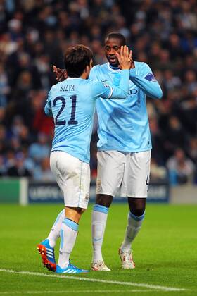 05.11.2013 Manchester, England. Yaya Toure; of Manchester City congratulates David Silva for winning a penalty during the Champions League group D . xPaulxKeevilx  ActionPlus11467624